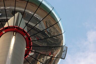2016: Brighton seafront, reflected in the i360 viewing pod's mirrored underside
