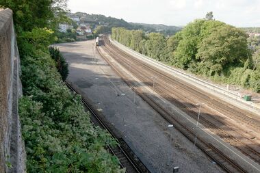 2018: The cleared site of the Preston Park Pullman Works, to the left of the track. This is where craftsmen repaired and maintained opulent Pullman railway cars for trains such as the Golden Arrow and the Brighton Belle