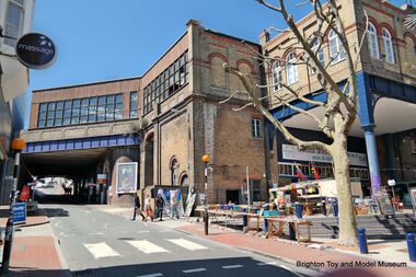 2015: Trafalgar Arches Market (right), at Trafalgar Arches Corner, the top of Trafalgar Street runs from the picture's centre bottom to left top. This mass of Victorian brickwork supports the South-East corner of Brighton Station